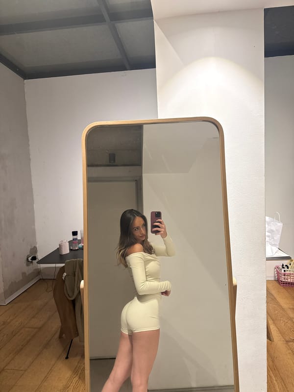 Woman Takes Mirror Selfie in Bodysuit in Herzliya