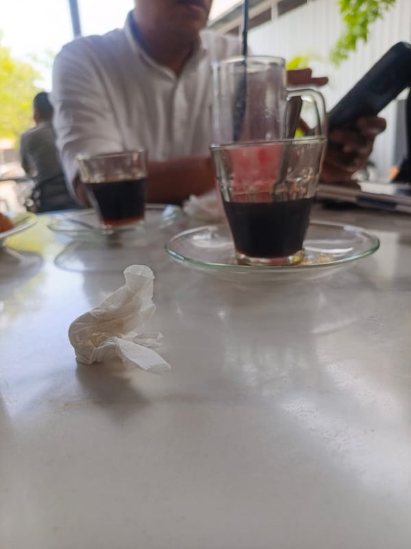 Morning cafe gathering documented in Keuniree, Indonesia