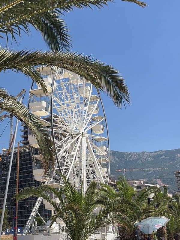 Budva's beachfront and streets buzzing on a summer morning