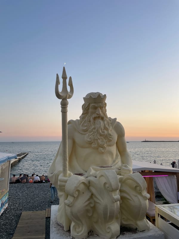 Summer evening on Sochi's waterfront promenade at sunset