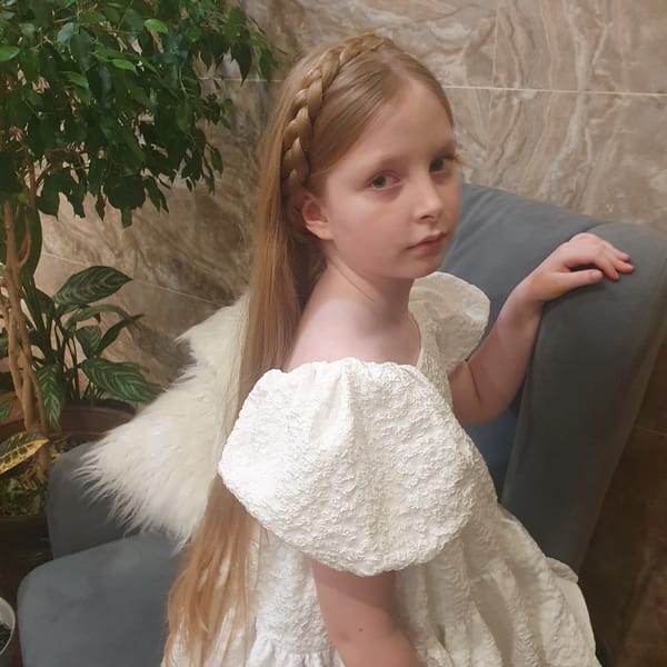 Girl rests on sofa in Chaikovsky, Russia