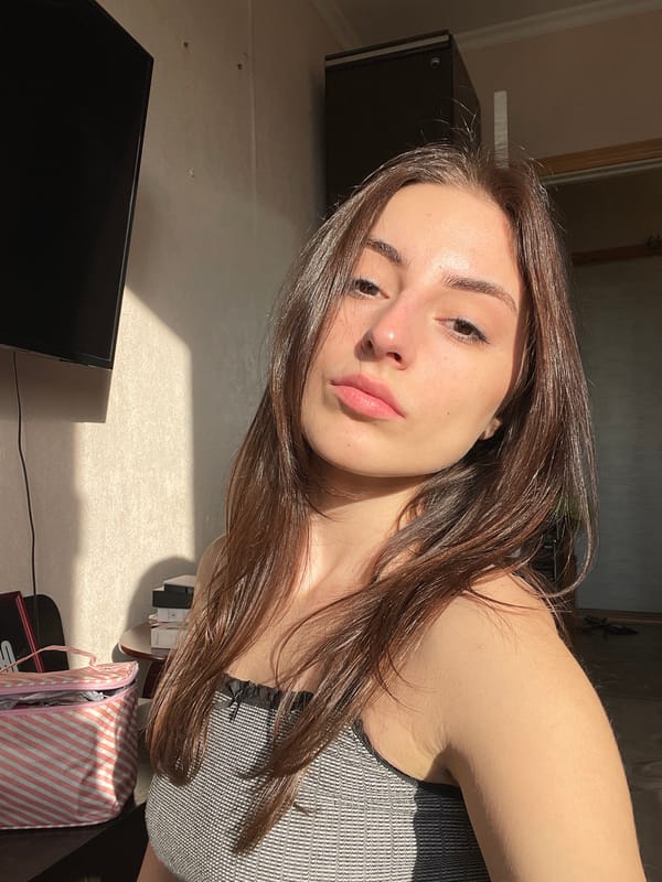 Young woman documents casual moments at Moscow residence