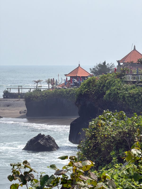Tanah Lot coastline: sea temple, stone turtles, and volcanic shores