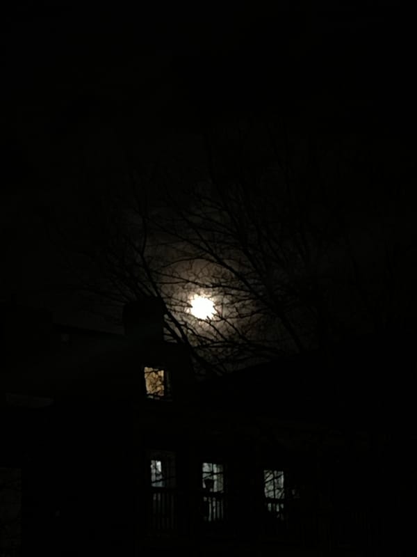 Full moon illuminates quiet Newburgh streets before dawn