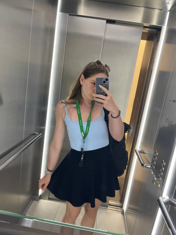Elevator selfies in Plovdiv, green lanyard suggesting an event