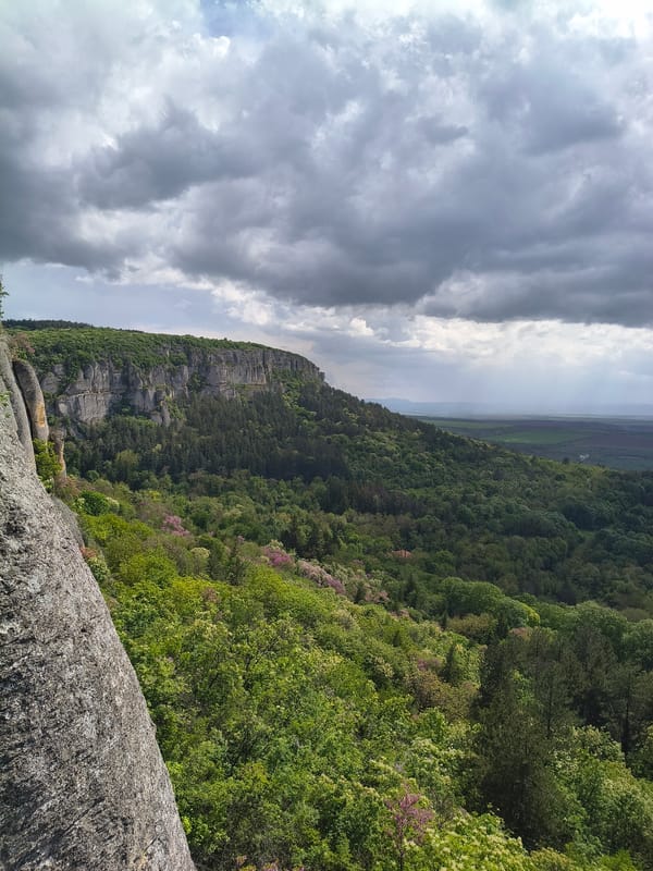 Tourist documents scenic views at Bulgaria's Madara archaeological site
