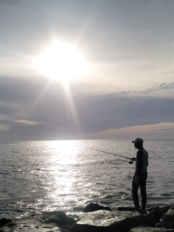 Dawn fishing and quiet coastal moments in Lhokseumawe