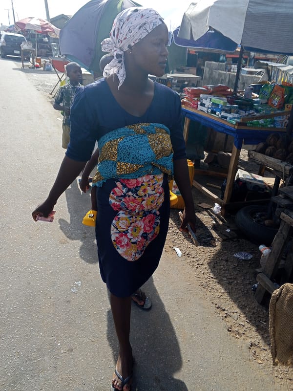 Nigerian market life documented in Adankolo during sunny afternoon