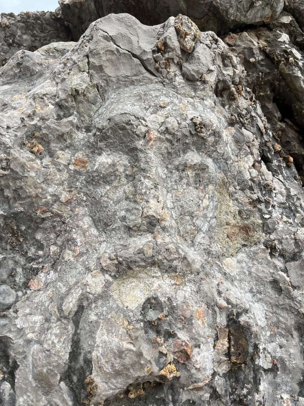Everyday moments captured in Budva: rock formation, boat maintenance