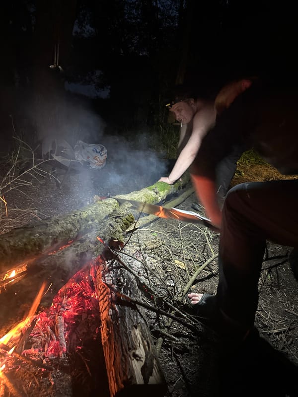 Nighttime campfire gathering documented in rural Belarus village