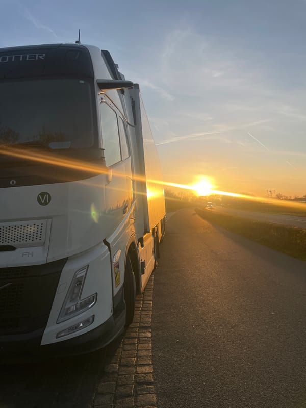 White truck parked in Volkel during late afternoon sun