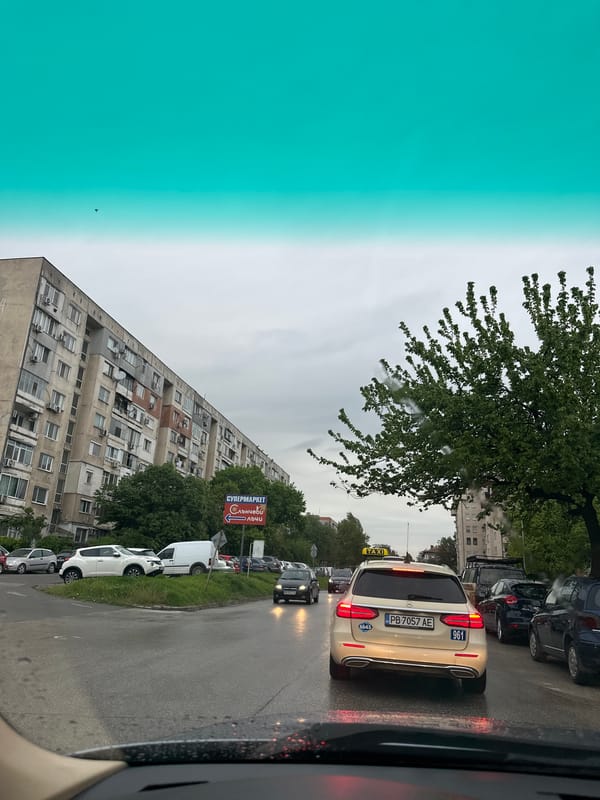 Driver documents rainy morning commute through Plovdiv, Bulgaria