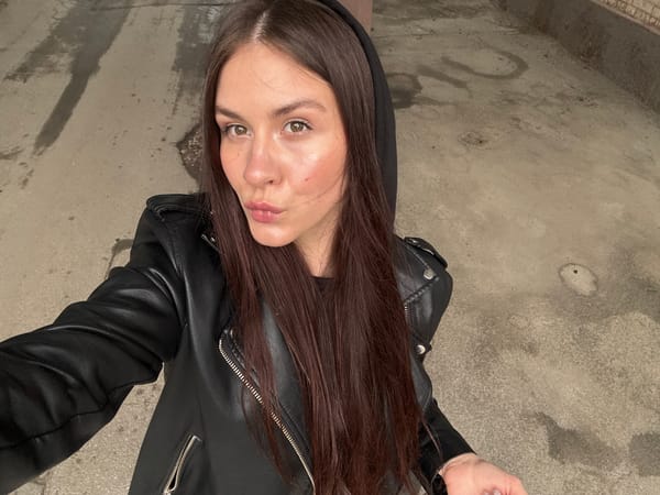Woman photographed at unusual angle in Saint Petersburg park