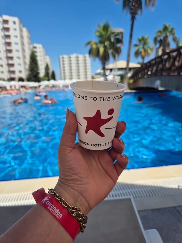 Sunny resort pool day at a Corendon Hotels property