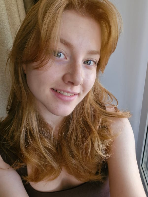 Morning portraits captured in Yekaterinburg show woman and white cat