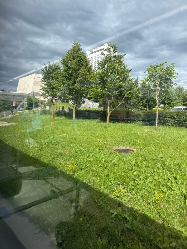 Zelenograd streetscape: modernist blocks, canal walkway, green lawns