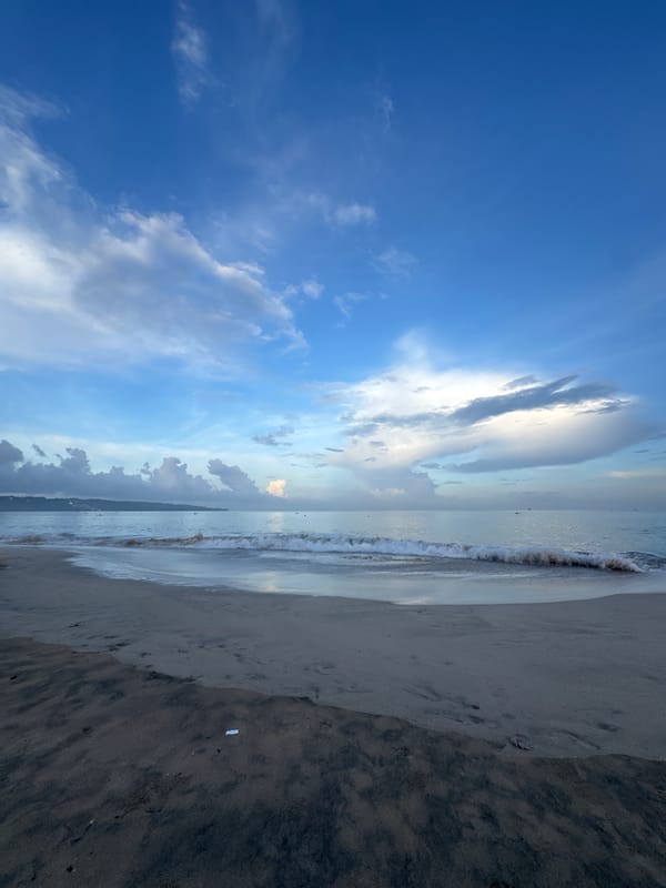 Evening fishing scene documented at Kuta Beach, Indonesia