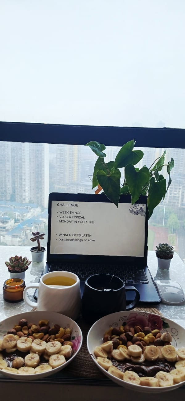 Workspace documented in Jiulongpo District with laptop and supplies