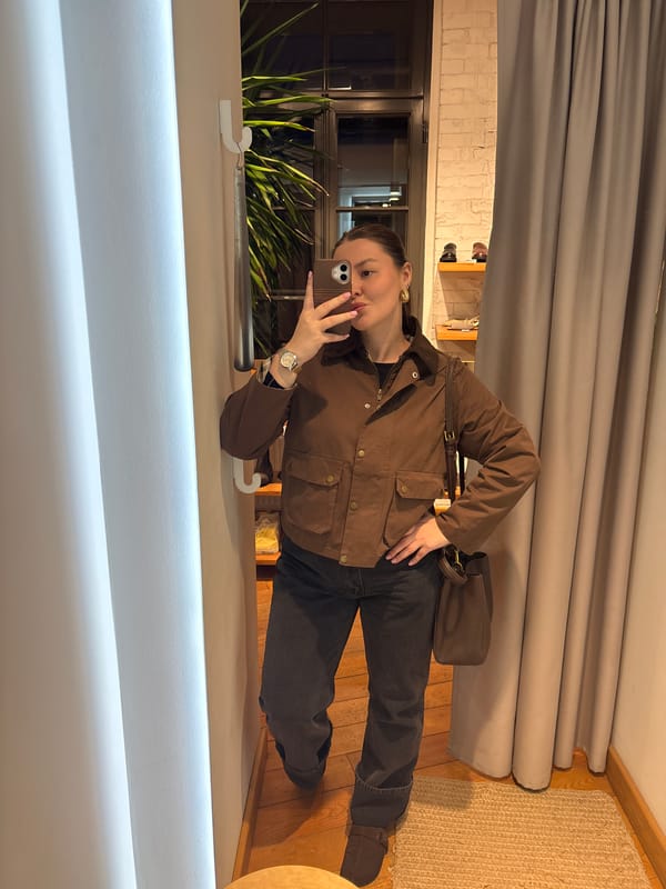 Shopper documents eclectic merchandise at Saint Petersburg retail store