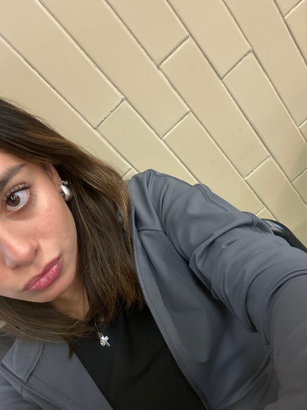 Person documents snack break with selfies and food photos