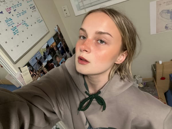 Woman takes selfies in Vancouver Friday evening