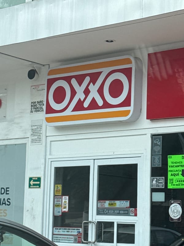 Evening street scenes captured near OXXO store in Puebla