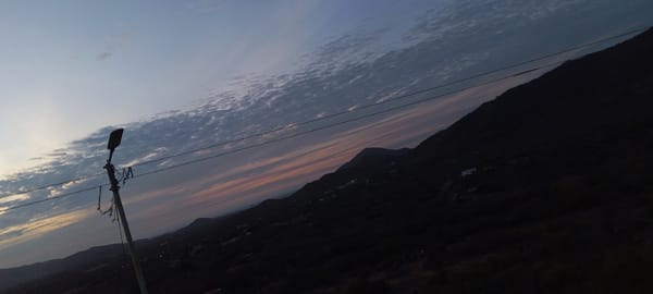 Boy sits on historic cannon at Venezuelan fort