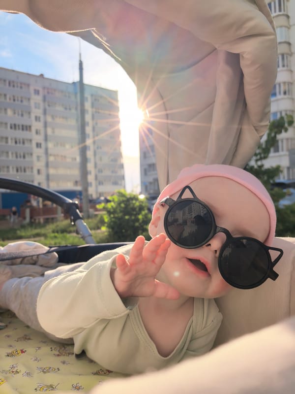 Ordinary moments captured in Russian village: baby, cat, mosquito