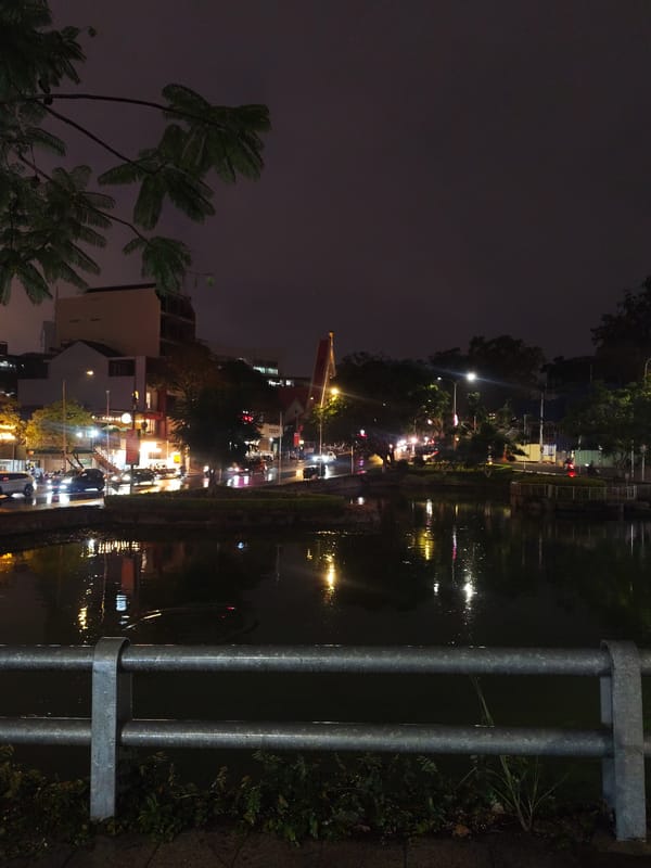 Rainy night on Da Lat's lakeside street near the Palace Hotel