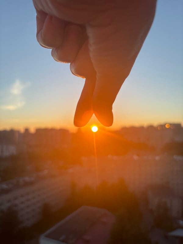 Golden hour city sunset with skyline shots and playful hand frames