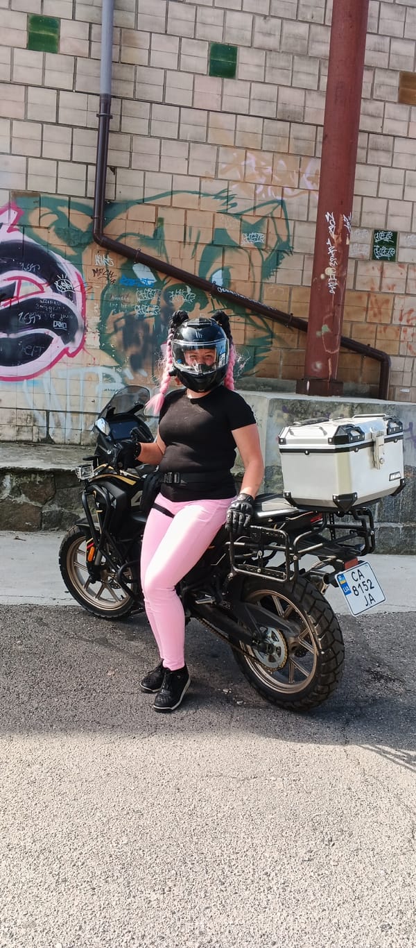 Motorcycle break amid spring flowers in Smila, Ukraine