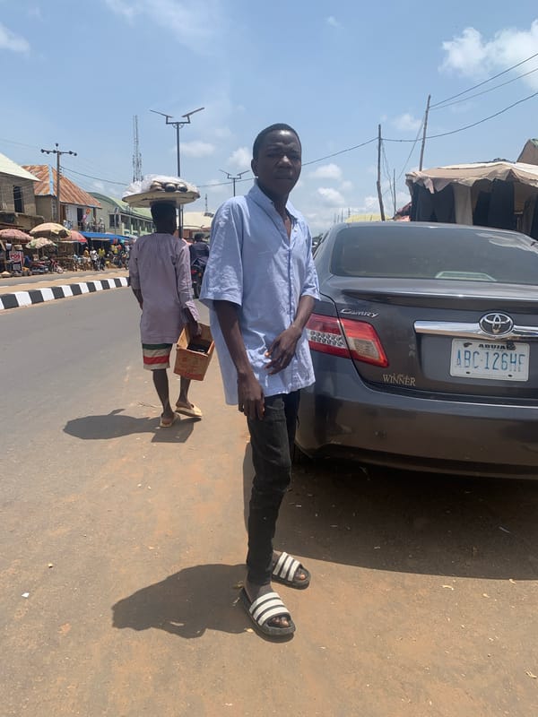 Midday street and market life in Akwanga, Nigeria
