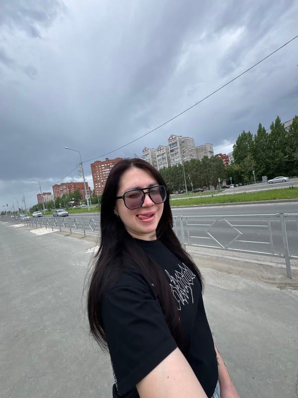 Woman walks husky, takes selfies during morning city stroll
