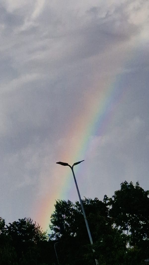 Rainbow over Riga's grey summer sky, July 2026
