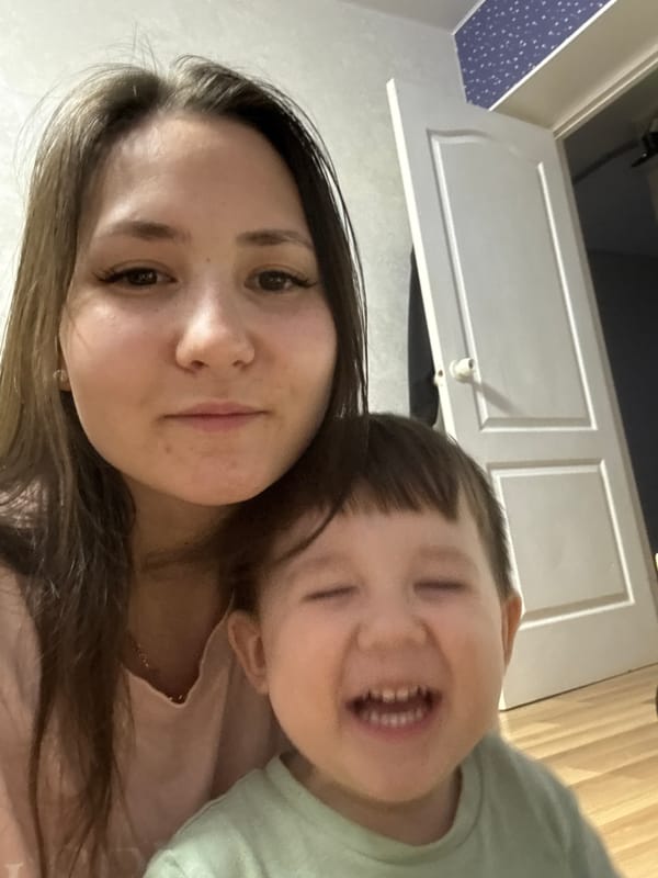 Mother and child share quiet afternoon in Chaikovsky, Russia