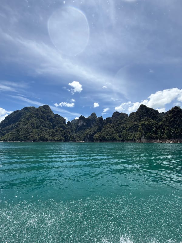 Turquoise lake and karst mountains at Khao Phang, Thailand