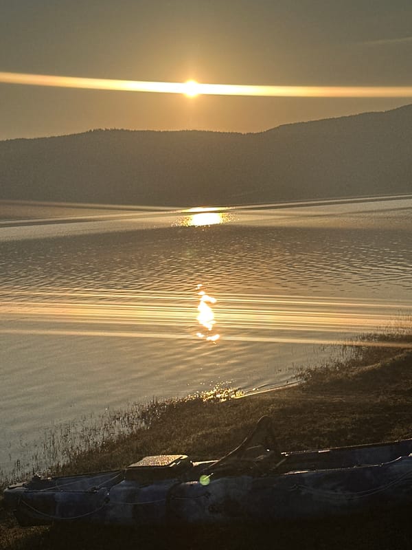 Sunrise over a Bulgarian lake, two angles