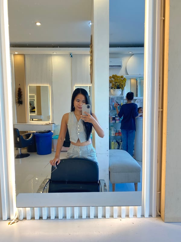 Woman takes salon selfie in North Kuta, Indonesia
