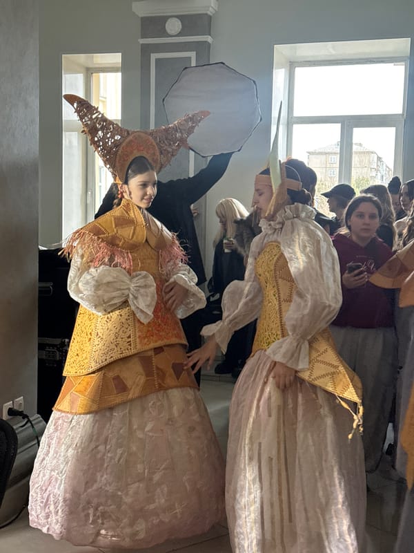 Costume event with traditional folk dress documented indoors