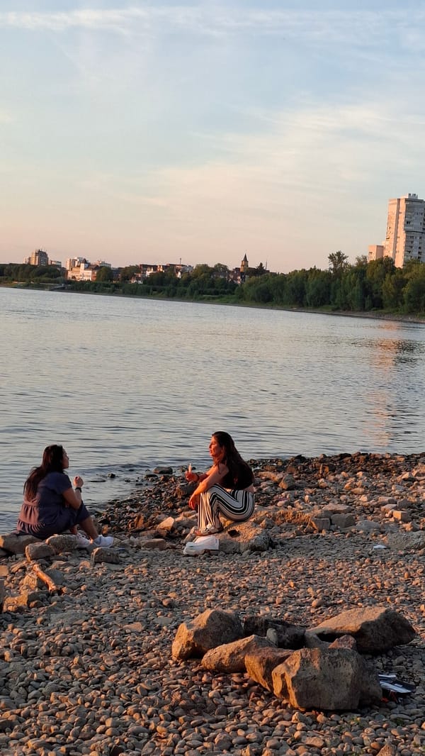 Golden hour on the Rhine's rocky Cologne shoreline