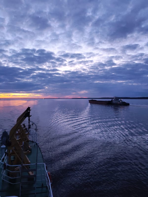 Twilight vessels spotted on water near Gorushka, Russia