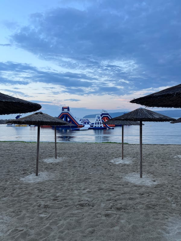 Varna Beach at dusk, inflatable water park offshore