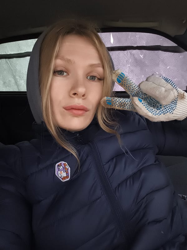 Woman and child photographed during morning in Russian village