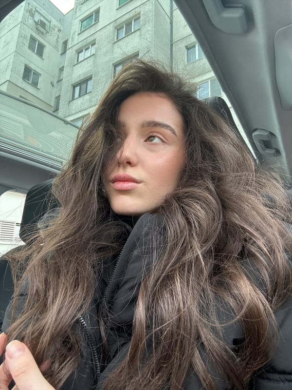 Woman takes car selfies in various positions during morning