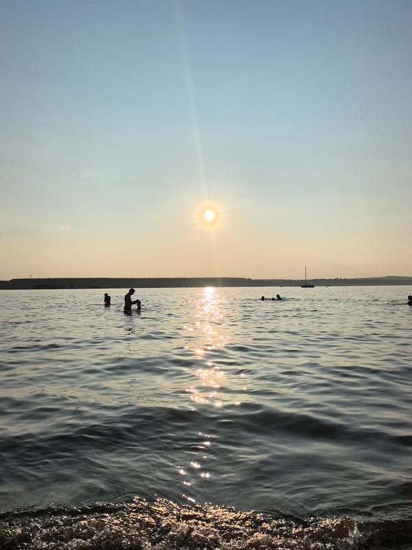 Paddleboarding on a sun-drenched river outside Perm