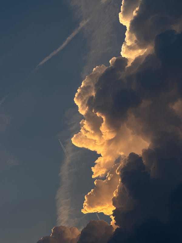 Storm clouds and golden light over Putten at sunset