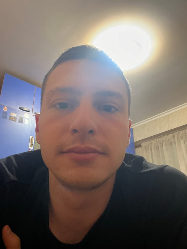 Man takes multiple selfies indoors in Burgas, Bulgaria