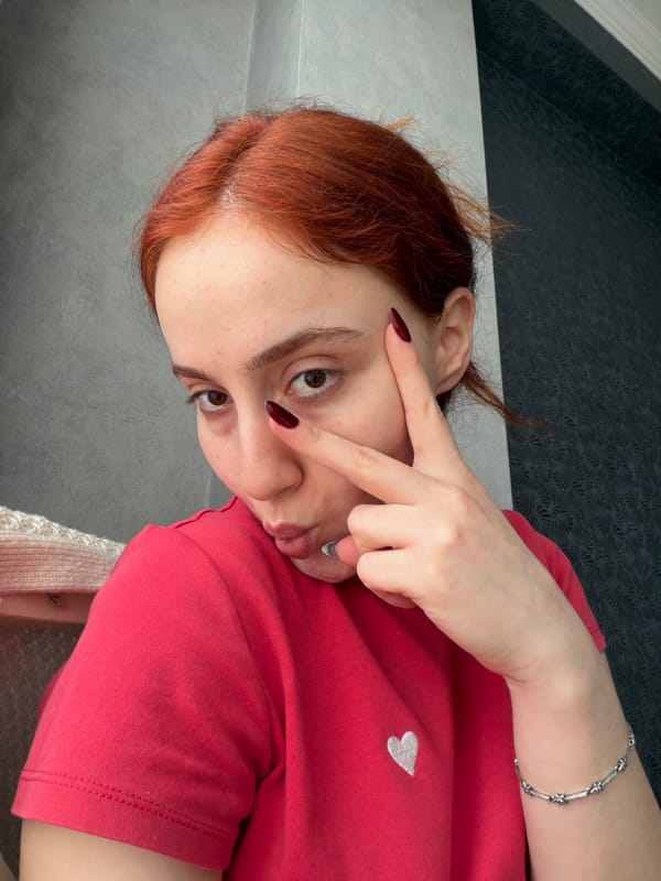 Woman takes selfies in Tbilisi apartment morning session