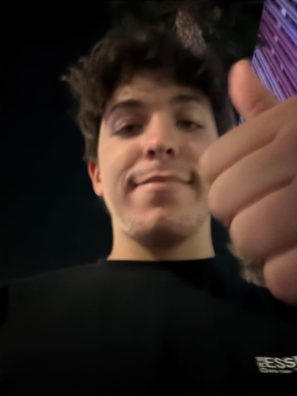 Young man takes indoor selfie in Riverside
