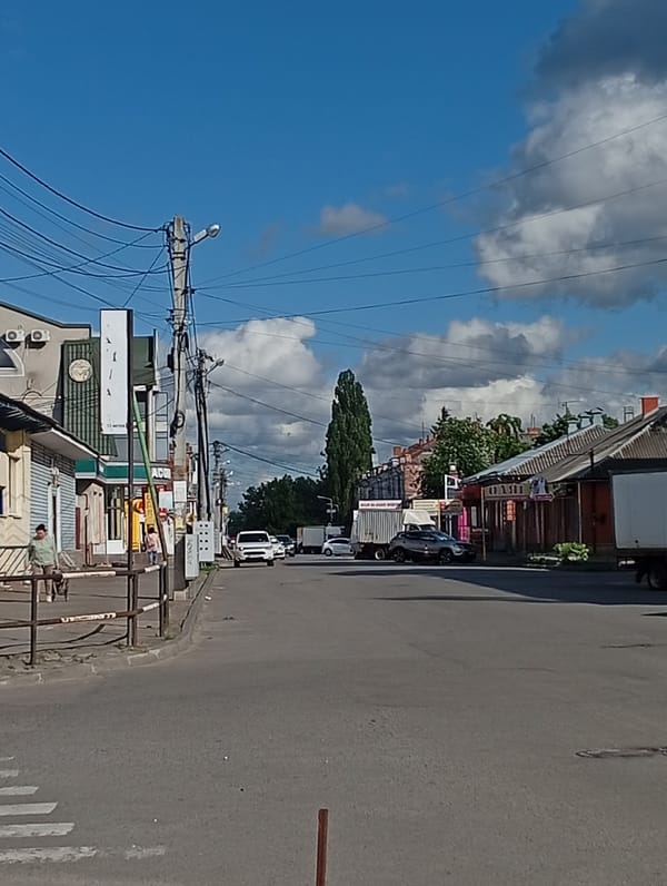 Ordinary afternoon documented across central Poltava streets and shops